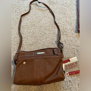 Rossetti Cognac color purse. New with tags.